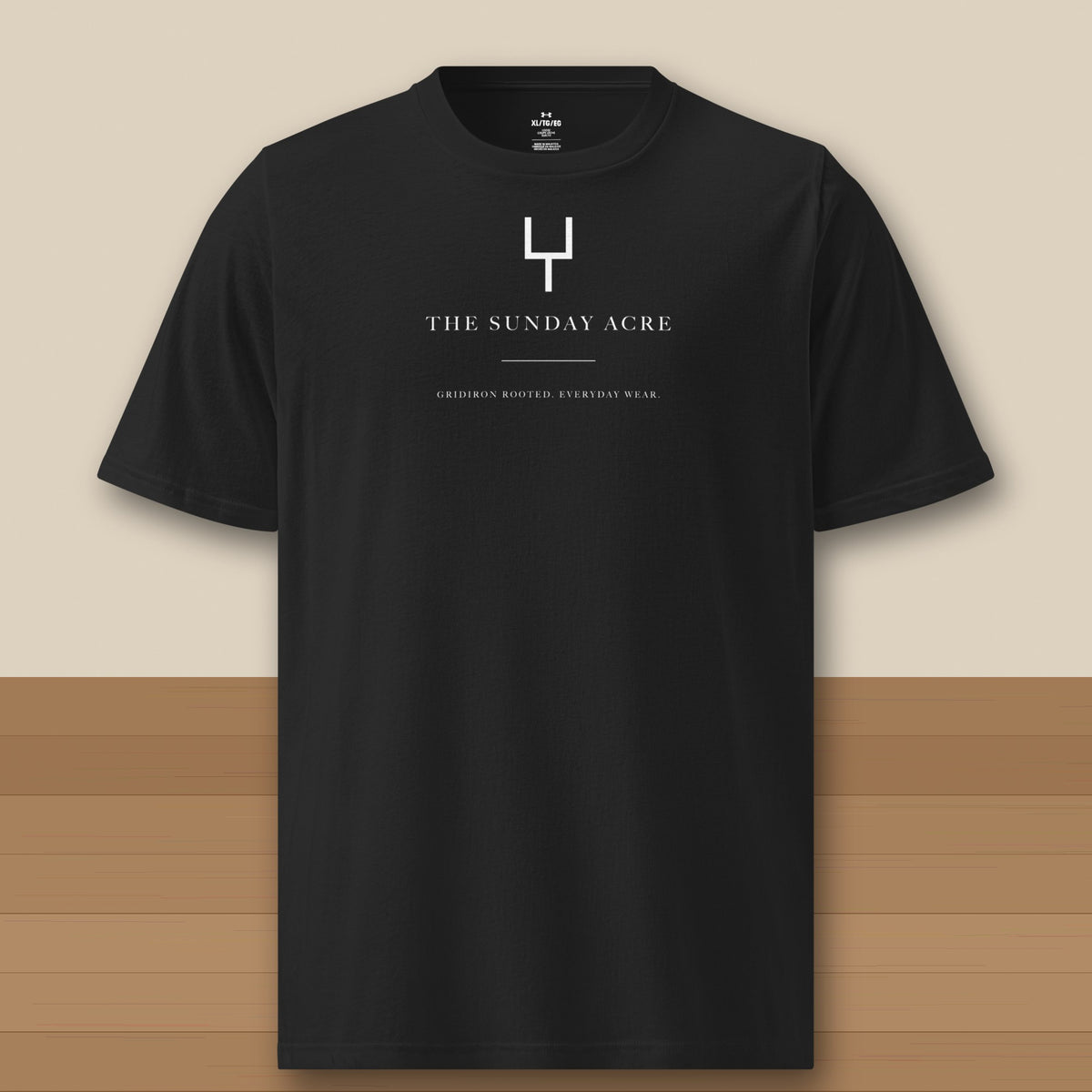 Under Armour Tee · Black · front · The Sunday Acre Gridiron Rooted Under Armour tee in black